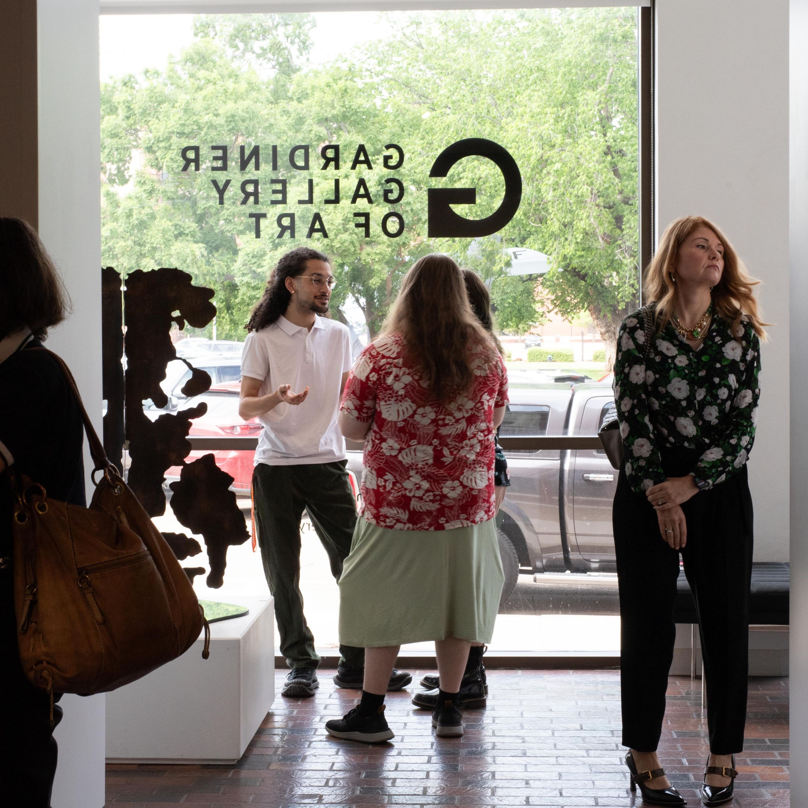 Multiple students in a group talking