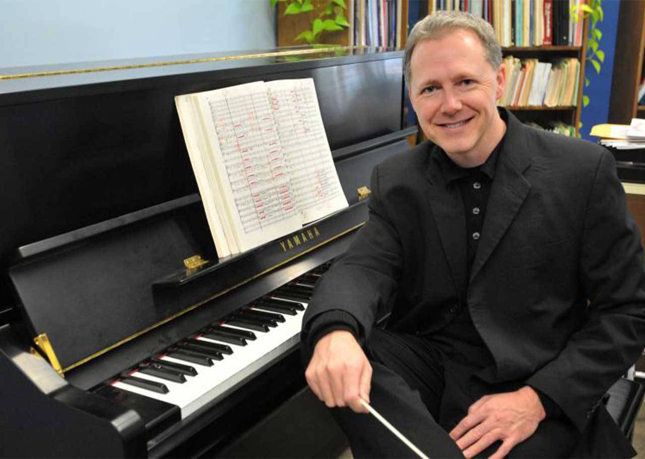 Tony Thornton sitting at a piano