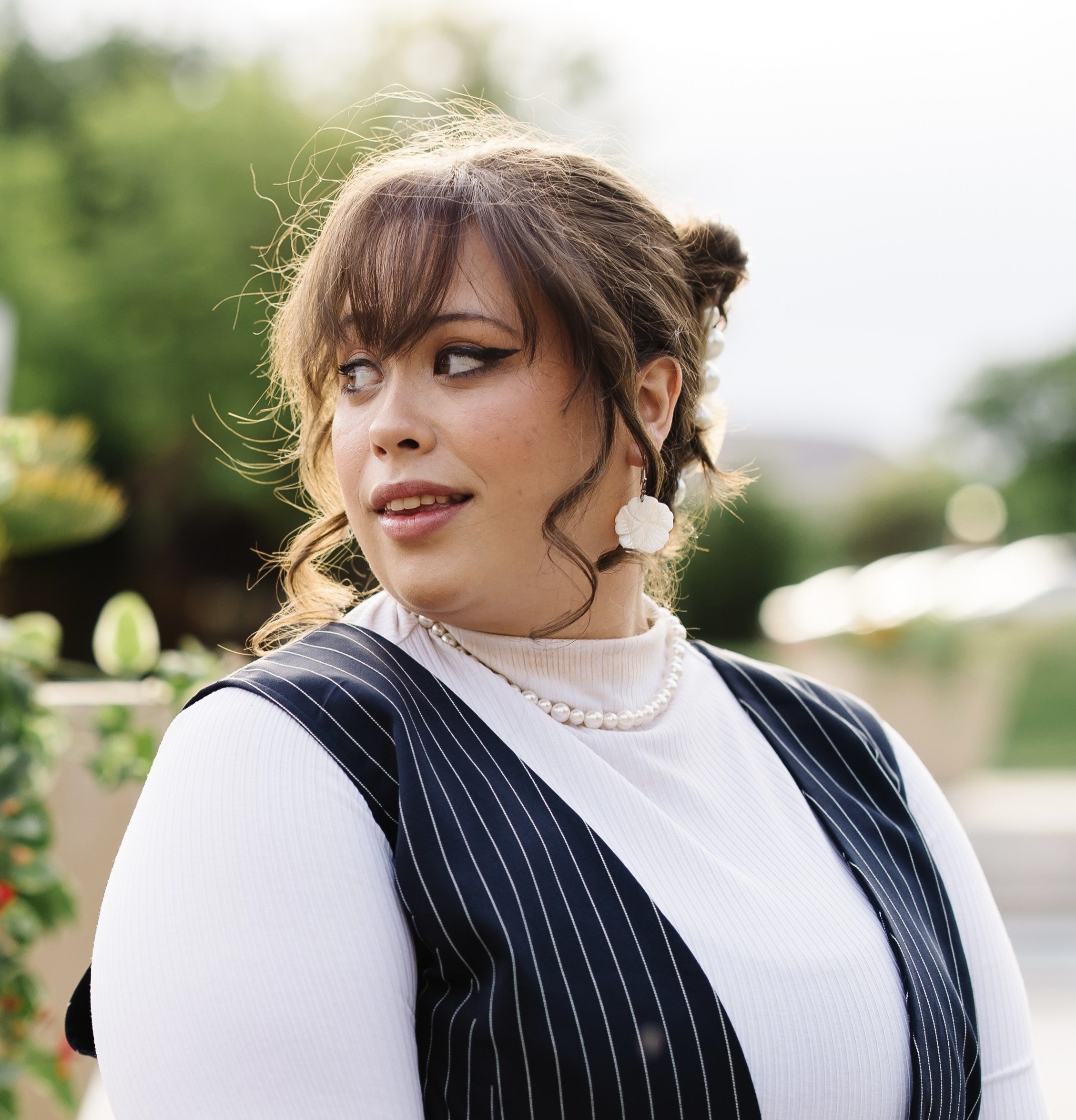A woman with brown hair.