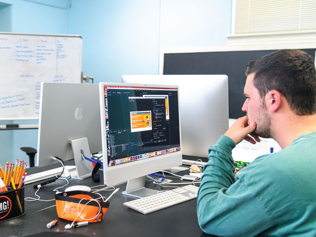 Male student working on a computer Male student working on a computer