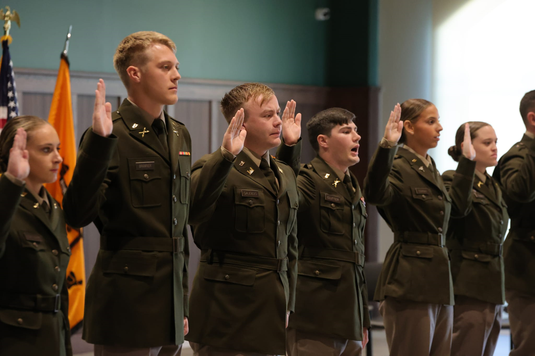 Cadets take the oath of office during commissioning