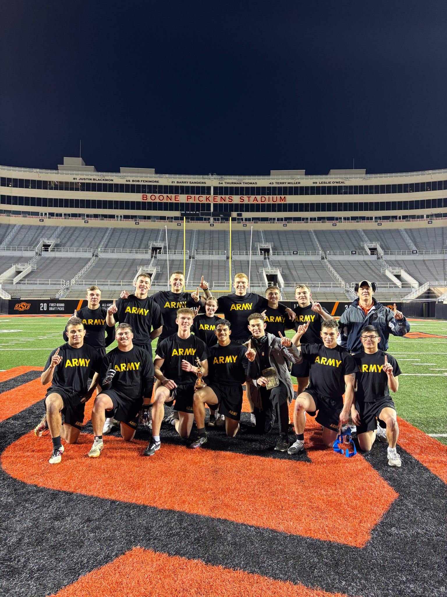 Cadets posing in BPS after winning the flag football game