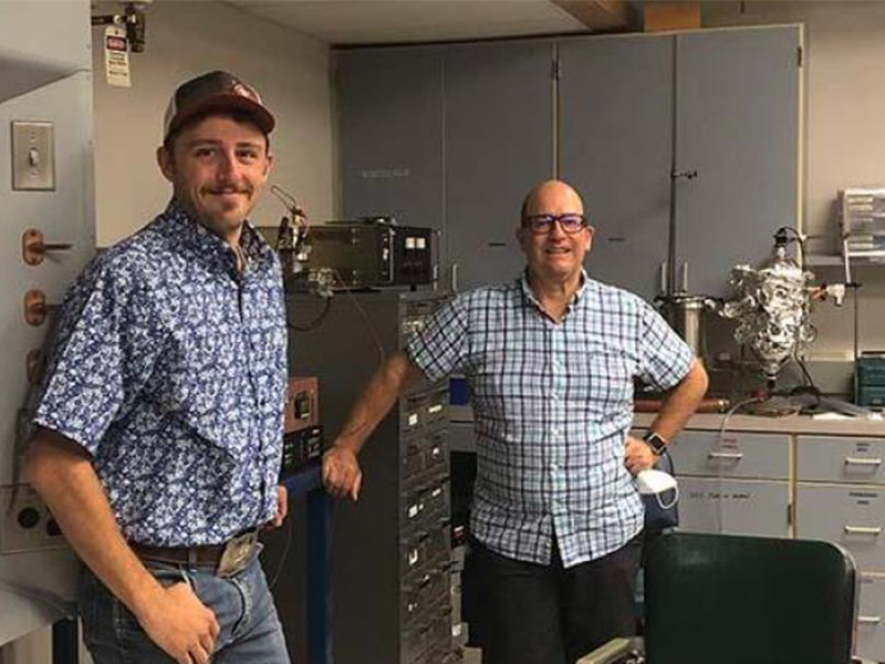 Dave McIlroy and Nate Dice standing in lab