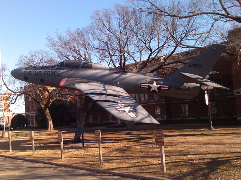 old airplane in front of ROTC building