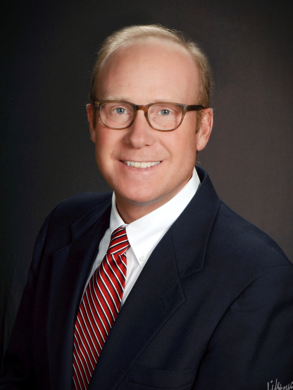 Photo of John Brett, III