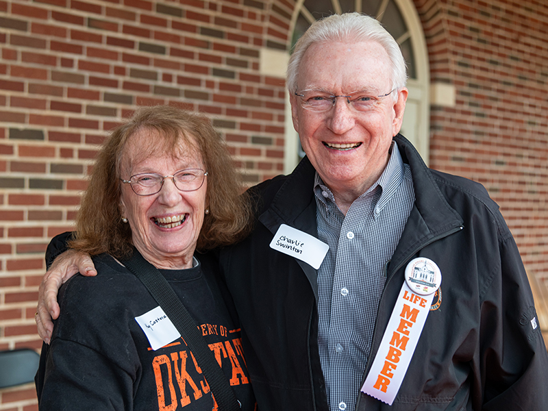 The Swintons smiling at the camera