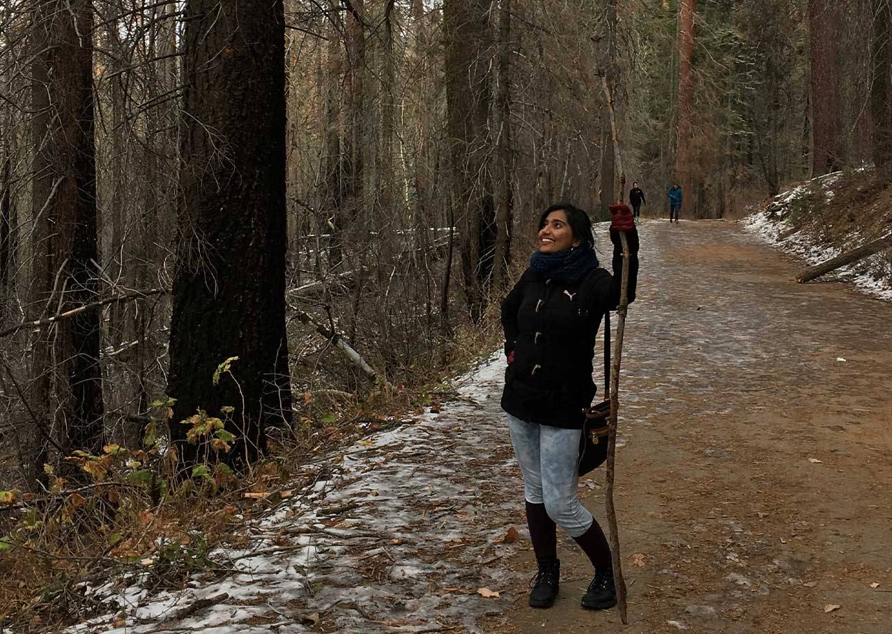 shamsuddin_rittika.jpg Rittika Shamsuddin walking through the woods
