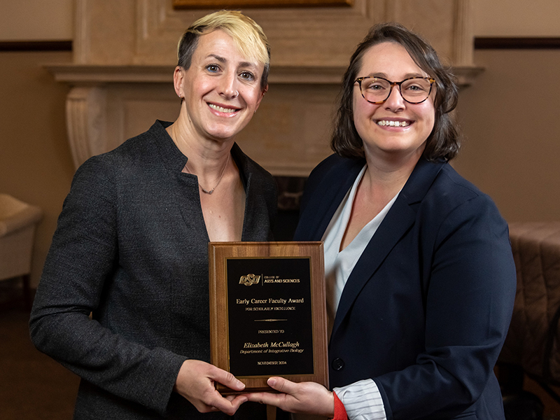 Elizabeth McCullagh receiving her award from Dean Cro Elizabeth McCullagh receiving her award from Dean Cro