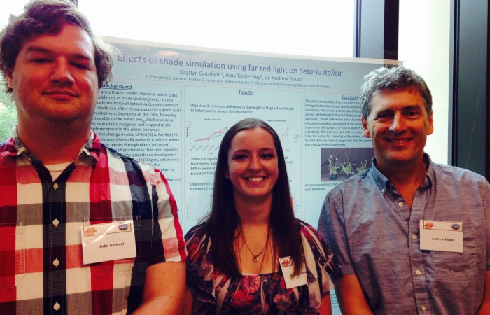 Kaytlyn with Andrew and John and her poster