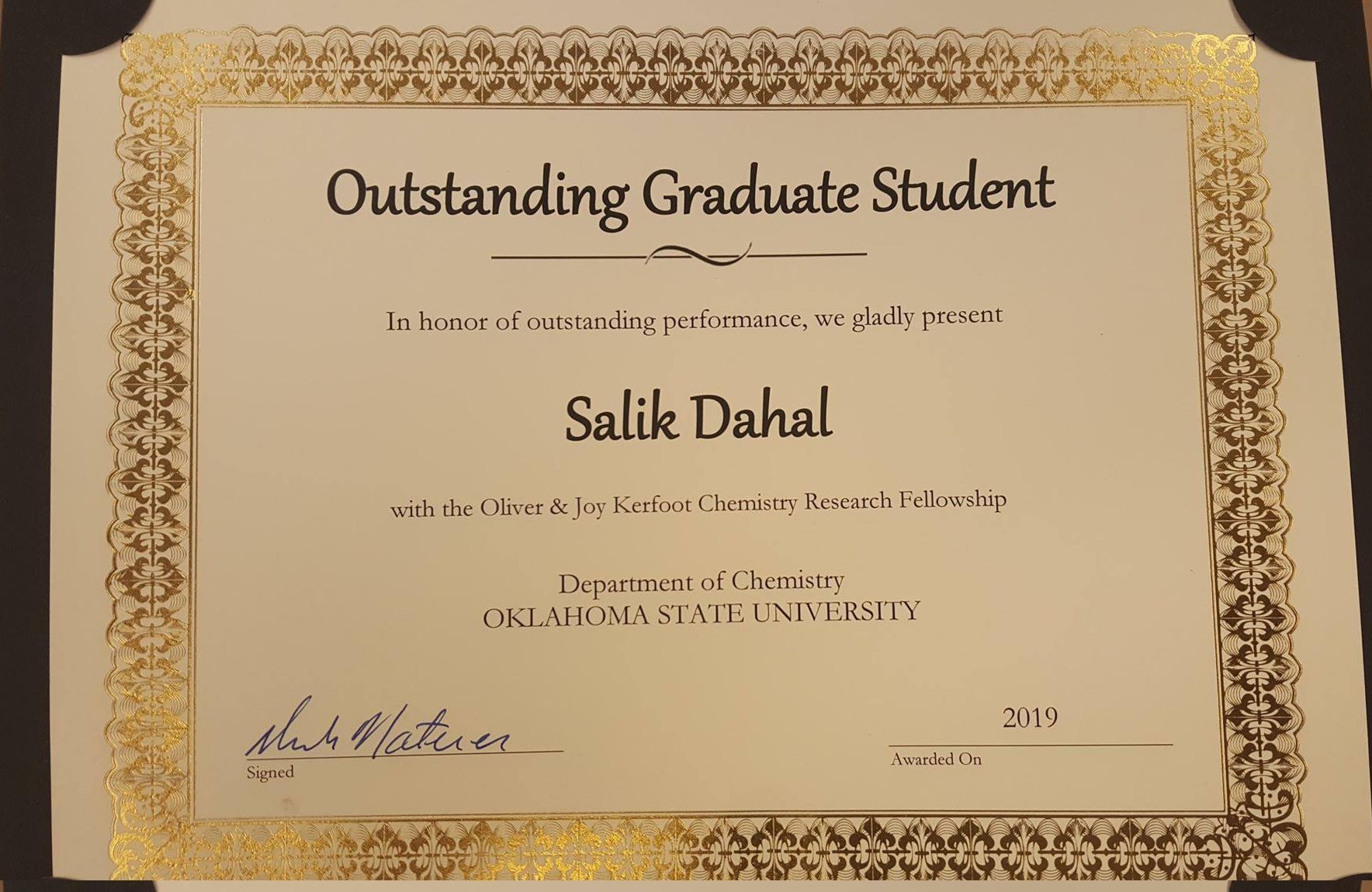 Salik R Dahal for recieving an Outstanding Graduate Student Award