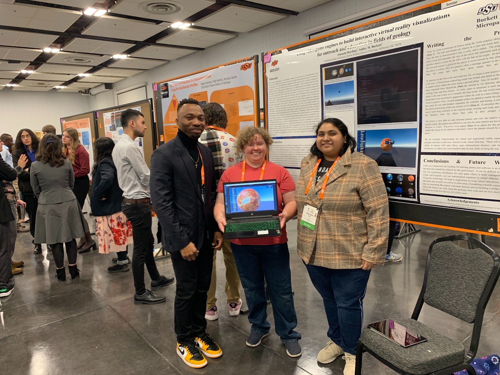 Amanda's Poster - OG, Amanda, and Debarpita at Amanda's poster. She brought her laptop to demo the VR experience she created!