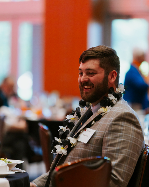 Blake Kirby enjoying company while getting ready for the program to start.