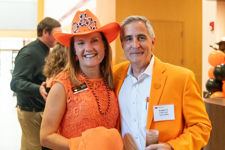 Camelia Knapp and Barrett Cieutat pose for a photo.