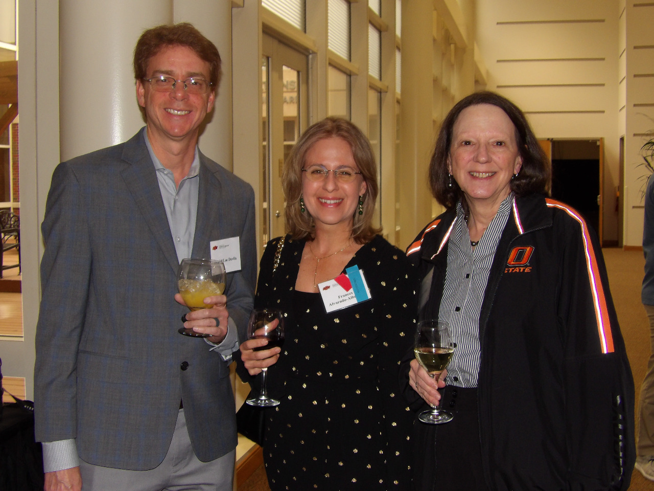 Dr. Daniel Lao Davila, Mrs. Frances and Mrs. Mickey visiting together before banquet begins.