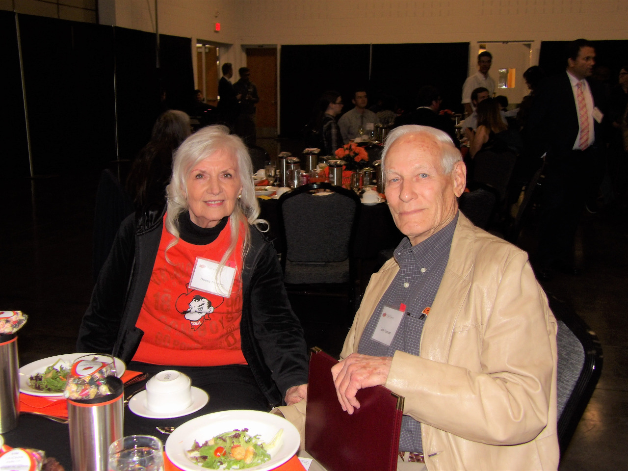 Mrs. Donna and Mr. Stan Norcom enjoying dinner together at the banquet.