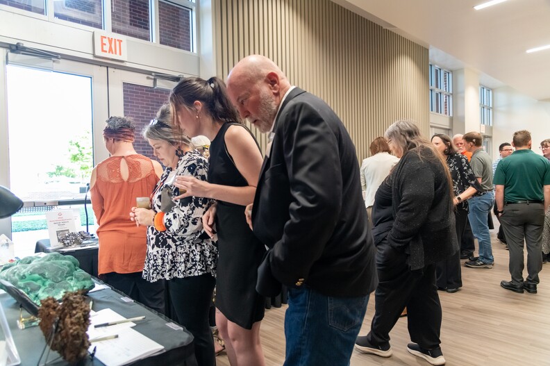 Guests checking out the Silent Auction.
