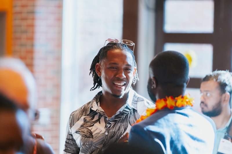 Jordon Massey and Silas Samuel visiting before Banquet begins.