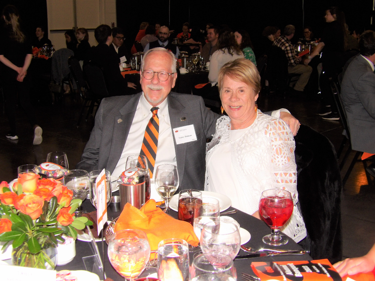 Mr. Lanny and Mrs. Cathy Holman enjoying dinner together at the banquet.