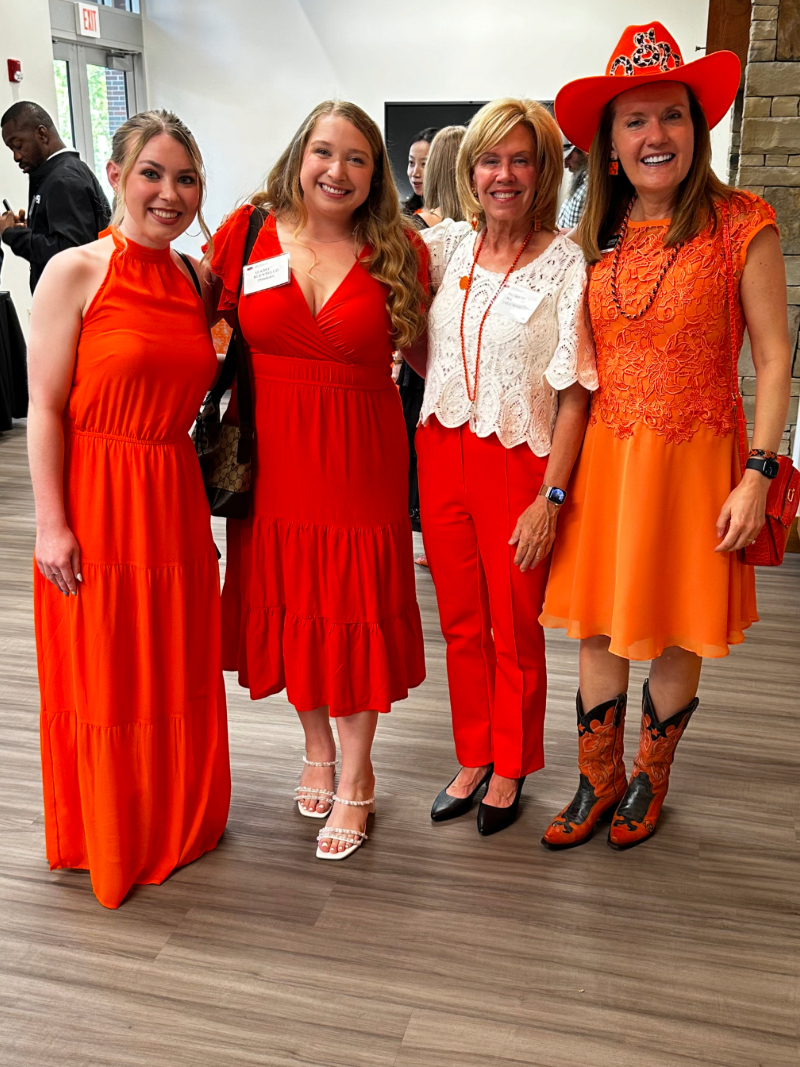 Megan Garrett, Izabelle Buentello, Patty Walker and Camelia Knapp pose for a group photo.