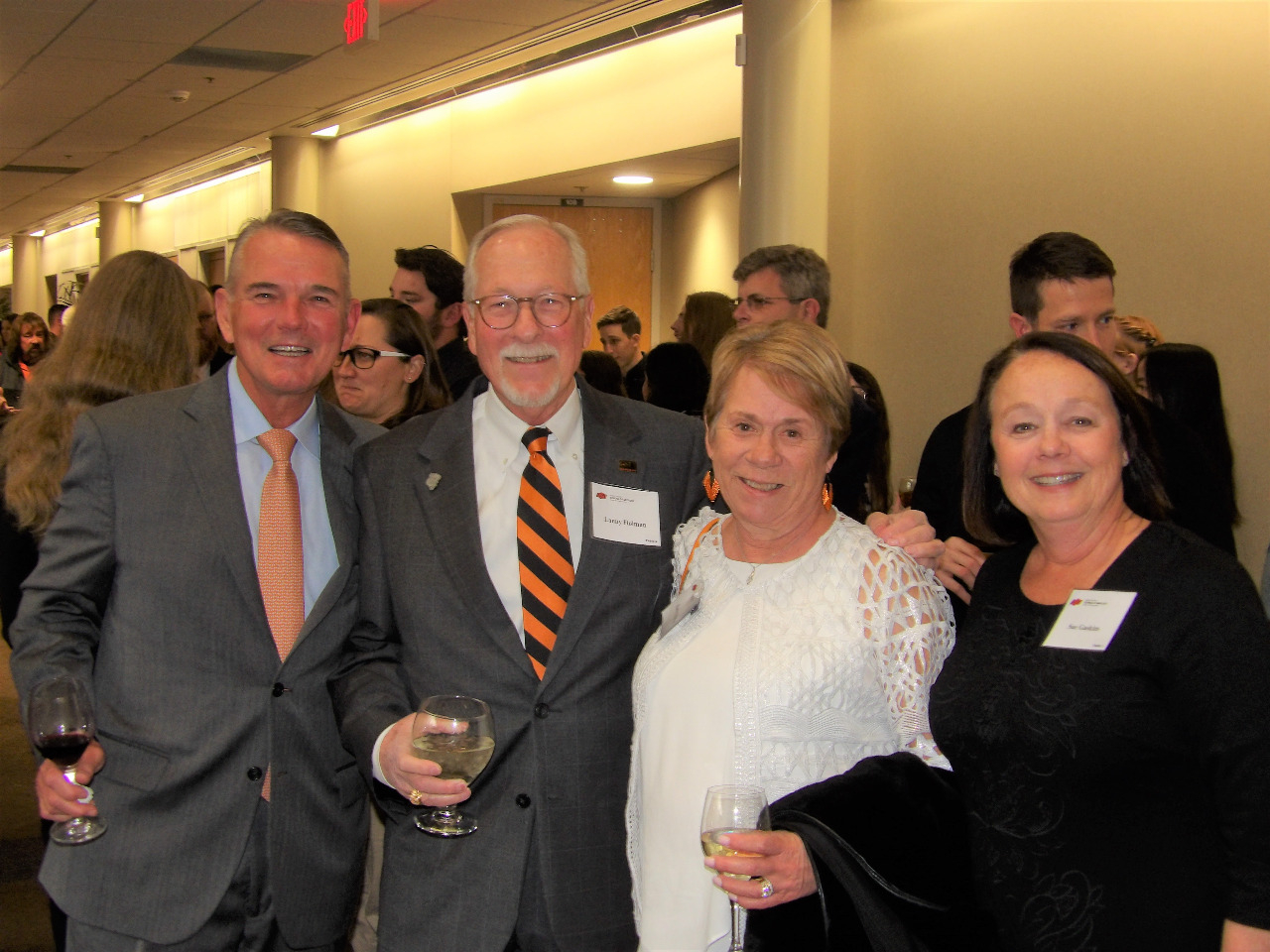 Mr. Mike Gaskins, Mr. Lanny Holman, Mrs. Kathy Holman and Mrs. Sue Gaskins posingfor a group photo before banquet begins.