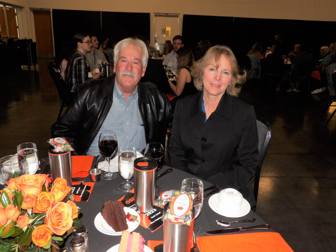 Mr. and Mrs. Joel Albert enjoying dinner at banquet.