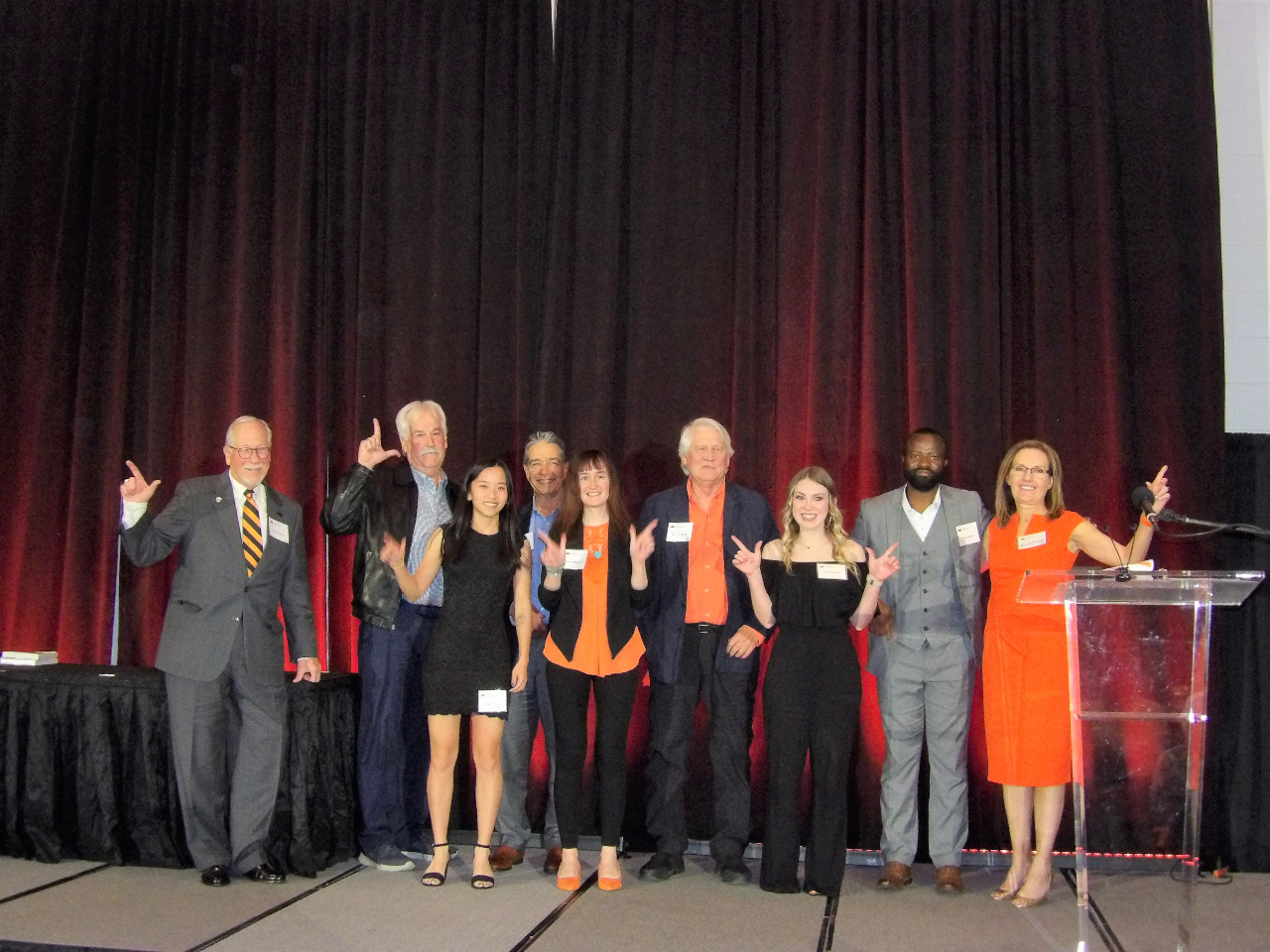 Four male Oklahoma Geological Foundation members with three female and one male award recipients along side Dr. Camelia Knapp.