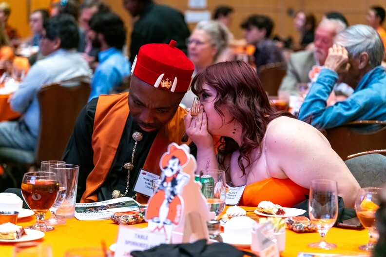 Oghalomeno Ononeme and Sydney Swisher sharing a little secret at the banquet.. 