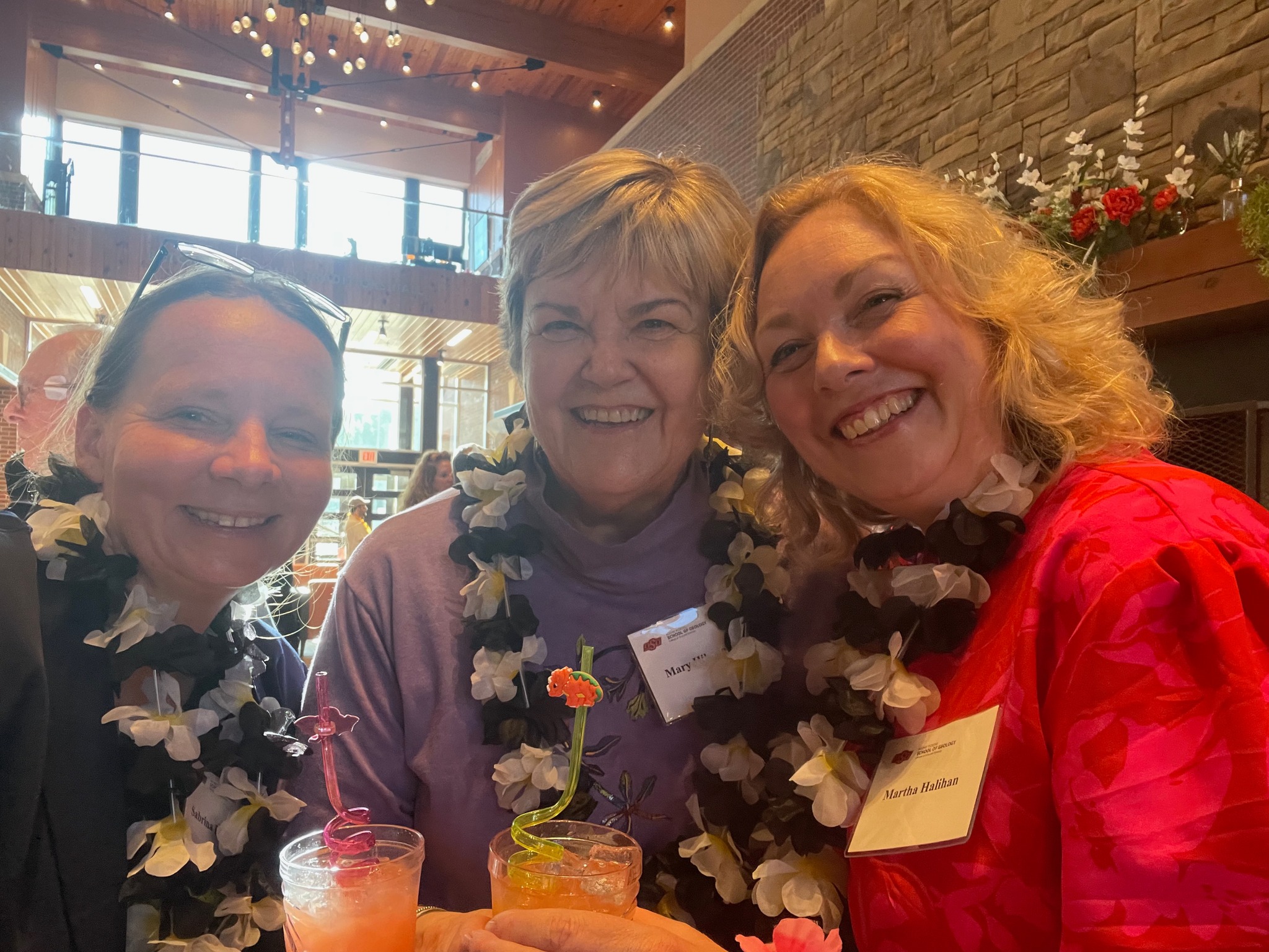Sabrina Beckmann, Mary Hileman and Martha Halihan posing together at the banquet.