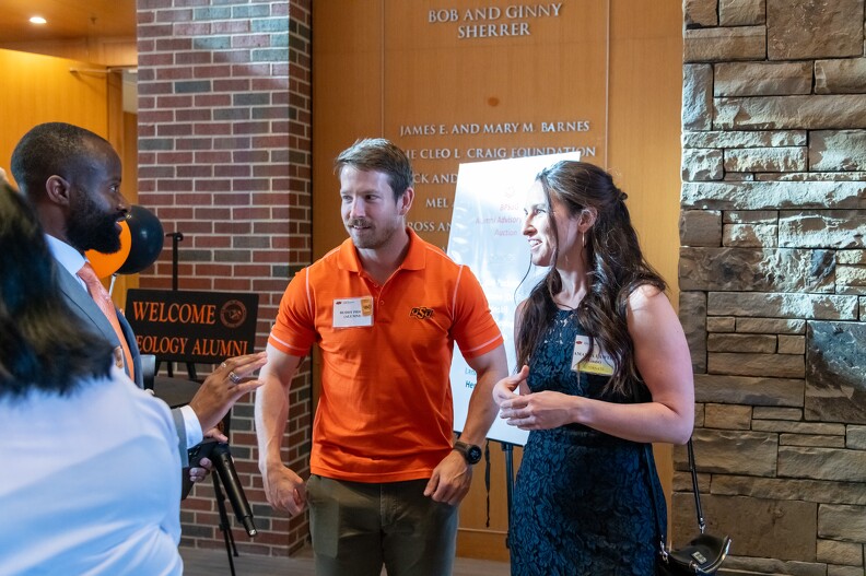 Silas Samuel visiting with Buddy Price and Amanda Walter before banquet.