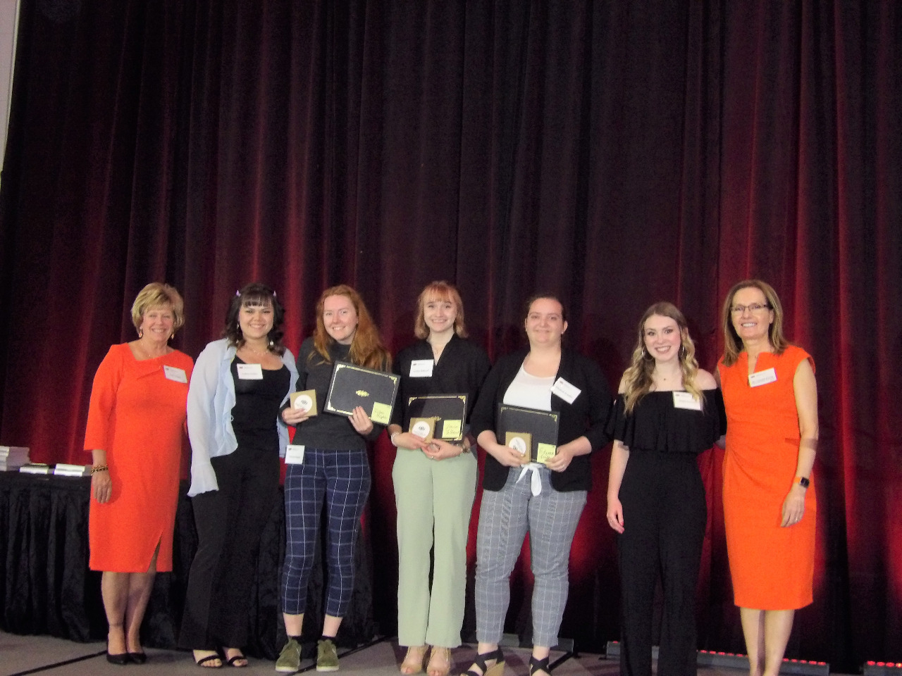 Five female scholarship recipients with Mrs. Patty Walker and Dr. Camelia Knapp.