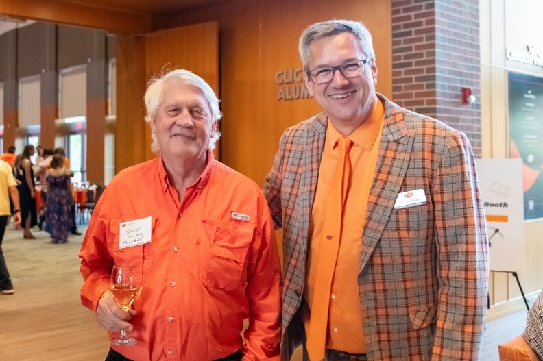 Terry Hollera and Todd Hailhan pose for a photo together.