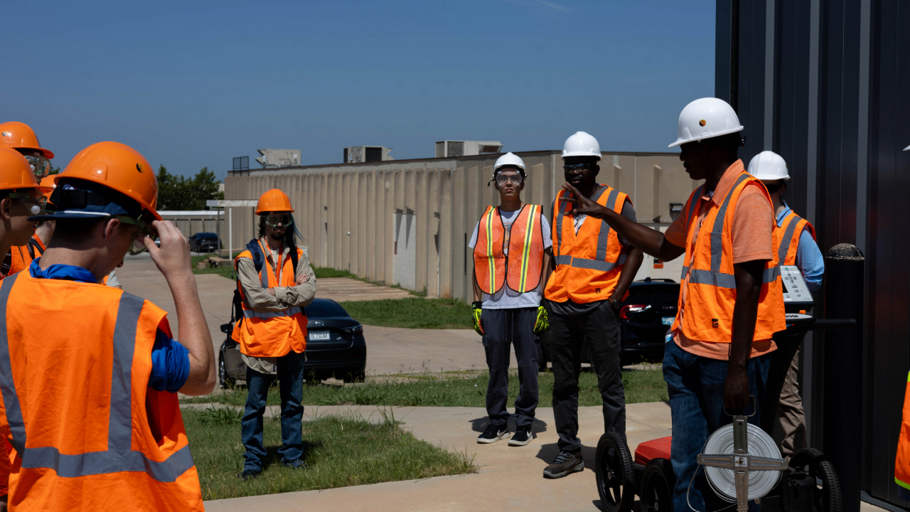 Dr. Andrew Katumwehe taking GEO-Rex campers out into the field, to get some hands-on learning. Dr. Andrew Katumwehe taking GEO-Rex campers out into the field, to get some hands-on learning.