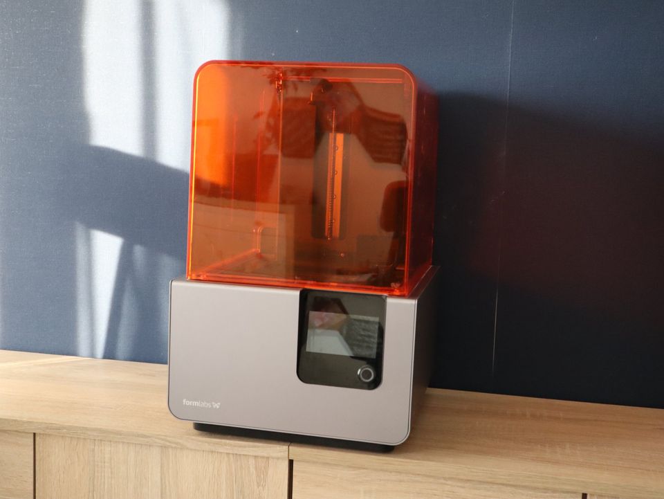 A Form 2 SLA 3D Resin Printer.