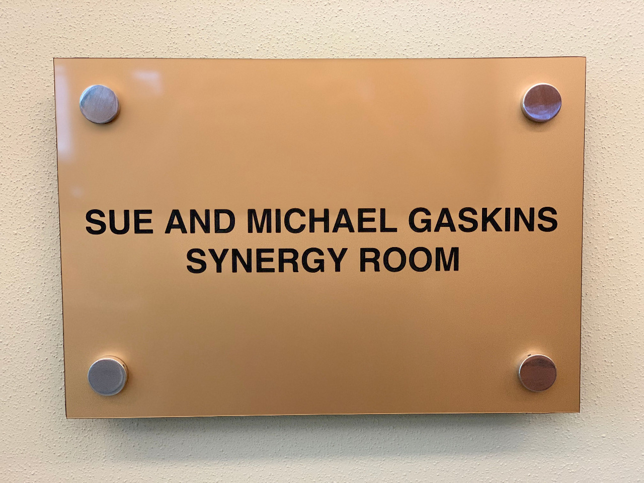 synergy room plaque