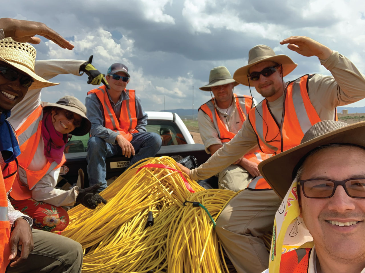 Hydrogeology students in back of pickup heading to do some work.