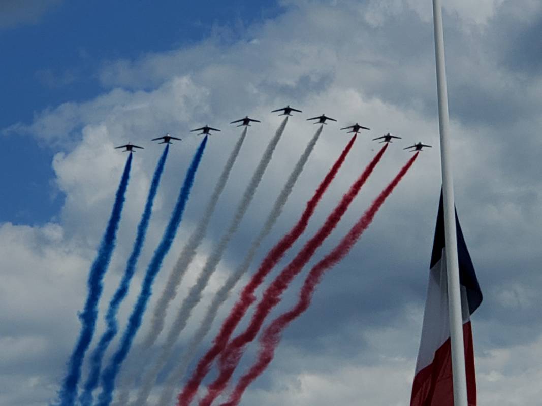 Planes flying with red and blue smoke Planes flying with red and blue smoke