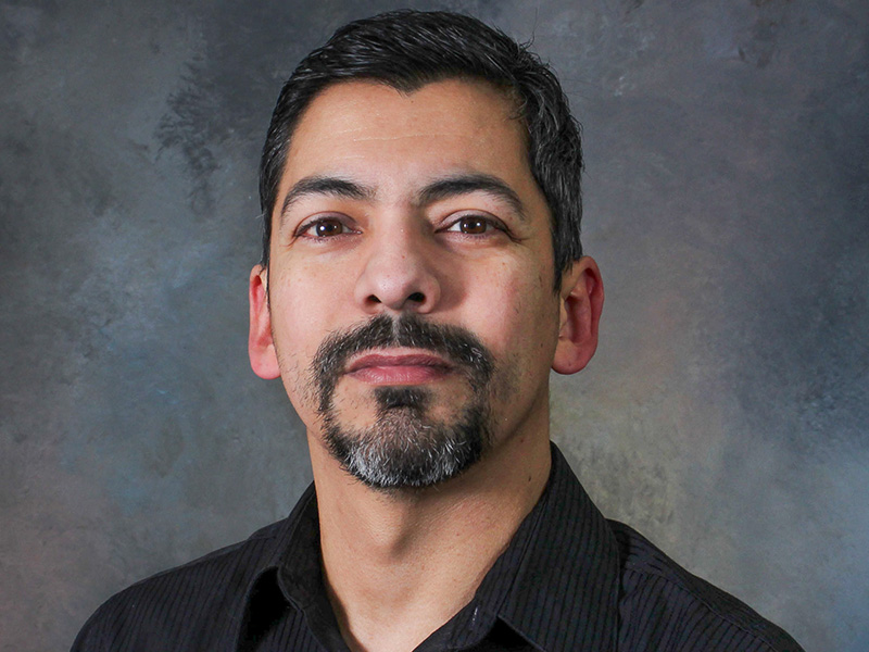 A man with brown hair.