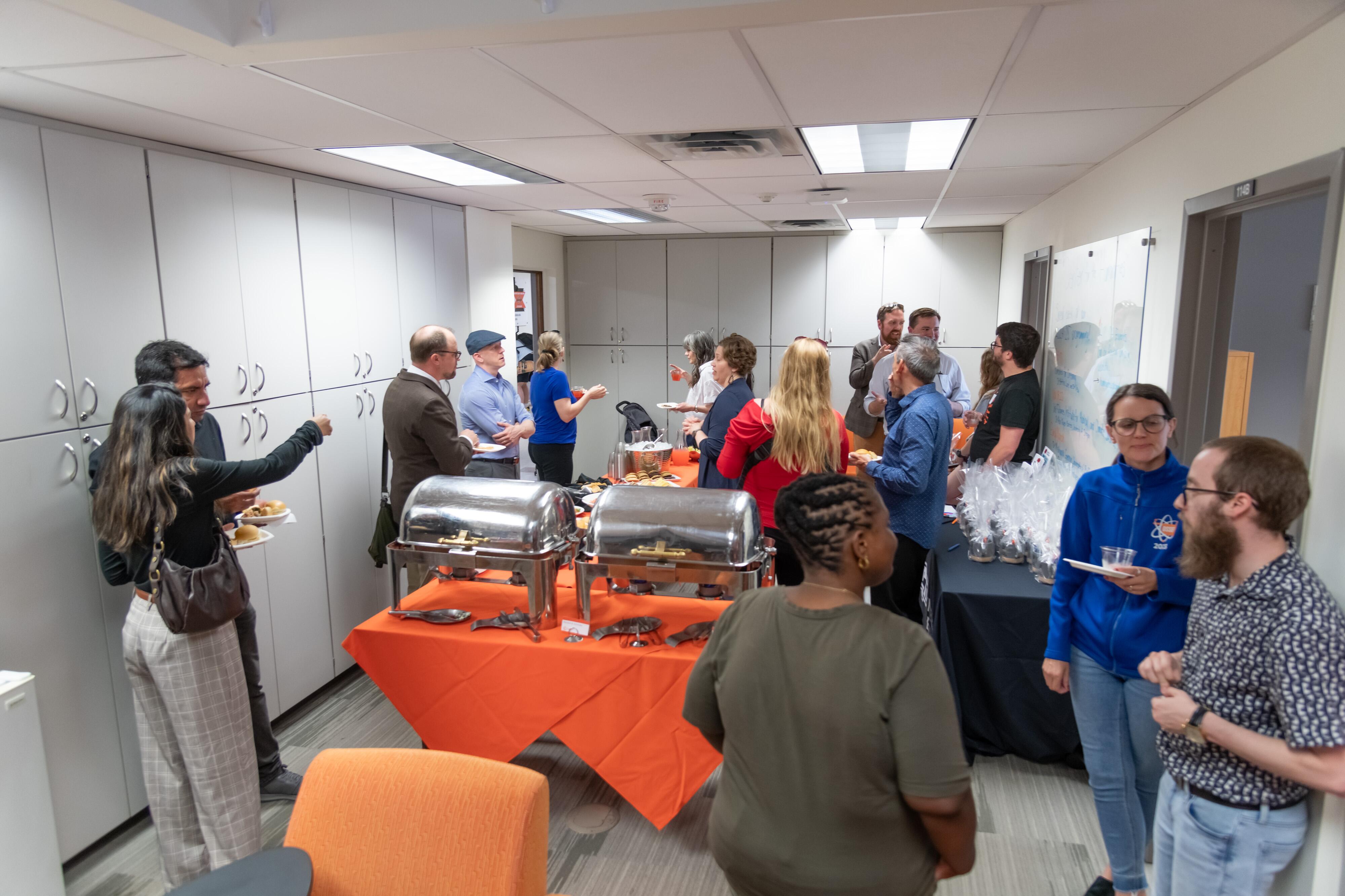 Overhead view of gathered people and food