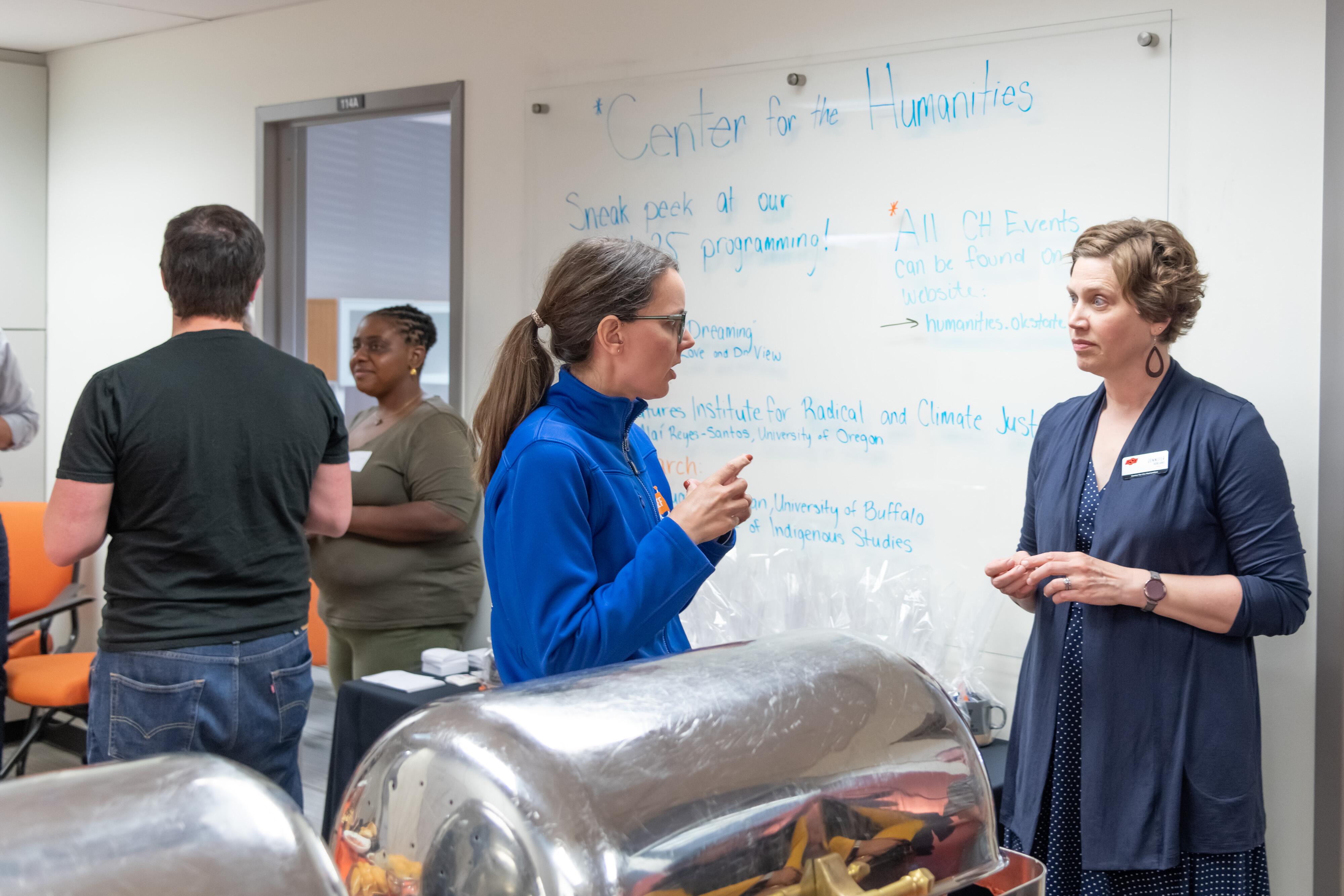 People talking in pairs