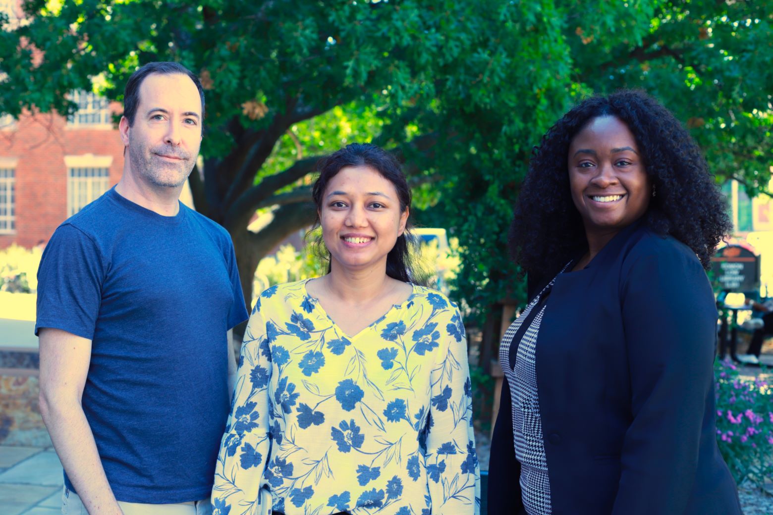 image of three people who are members of the environmental group.