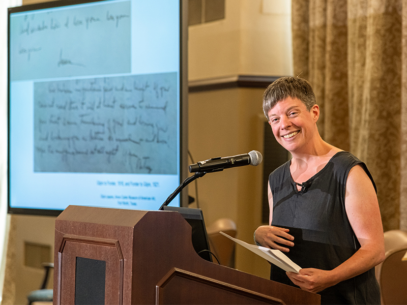 Louise Siddons presenting looking directly at camera and smiling Louise Siddons presenting looking directly at camera and smiling