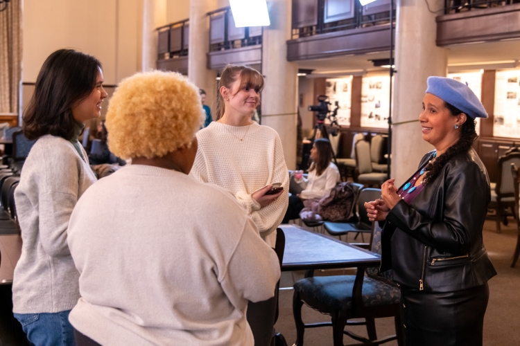 dr. reyes-santos with three female college students dr. reyes-santos with three female college students