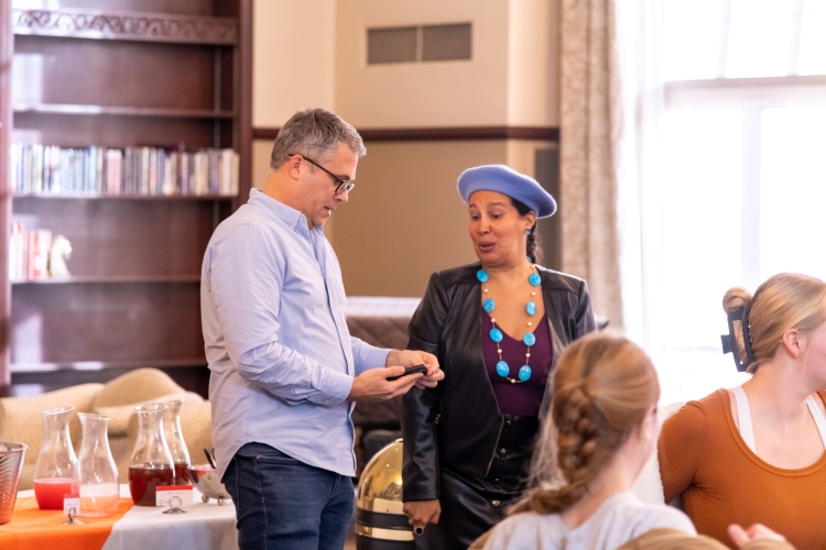 dr reyes-santos standing with a male scholar dr reyes-santos standing with a male scholar
