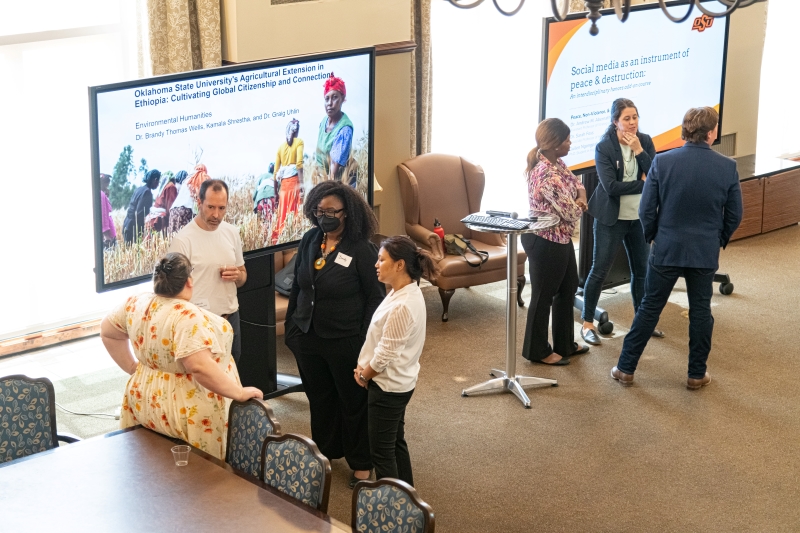 presenters speaking to audience members presenters speaking to audience members