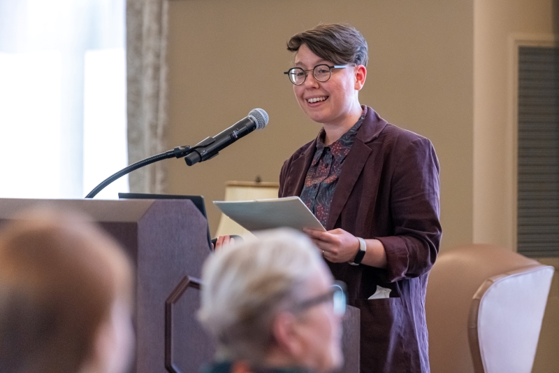 image is of Doyle at a podium image is of Doyle at a podium