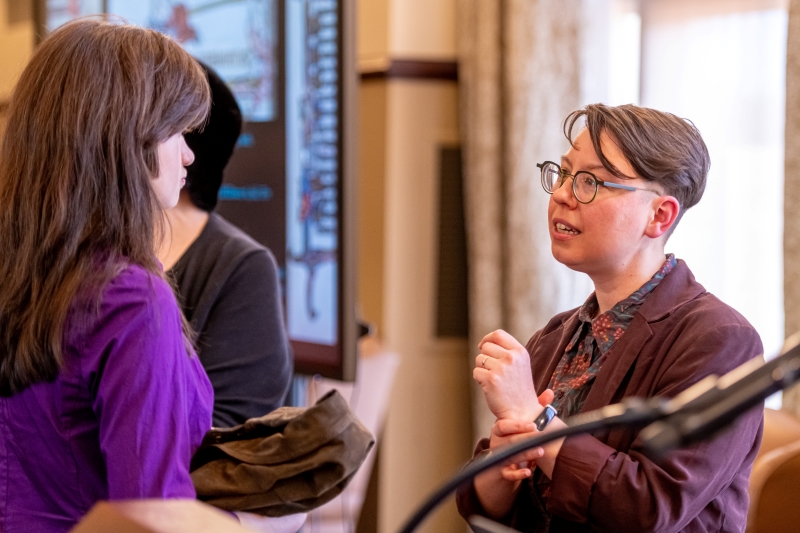Doyle speaking with a student Doyle speaking with a student