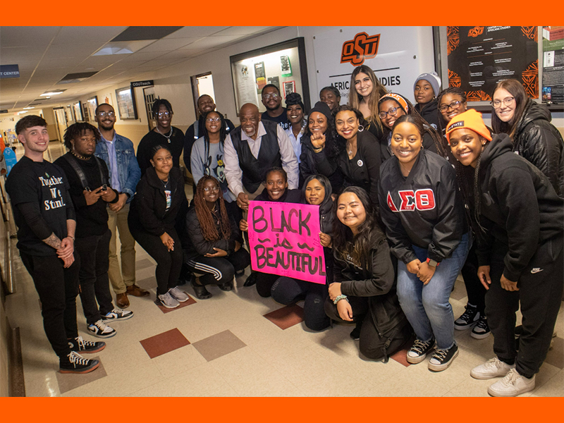 A large group of black students gathered outside of Africana Studies.