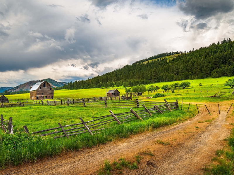 Old red barn along a country road