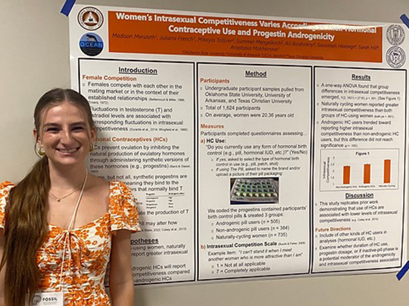 Madison with her poster at FOSSIL