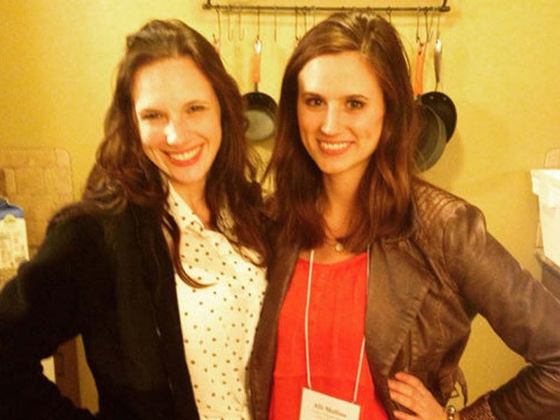 Two females with their arms around each other smiling for the camera at the Society of Pediatric Psychology Annual Conference
